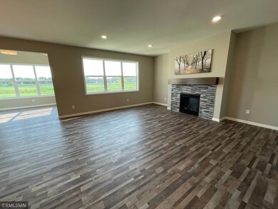 Main floor Great Room with Tiled Gas Fireplace.