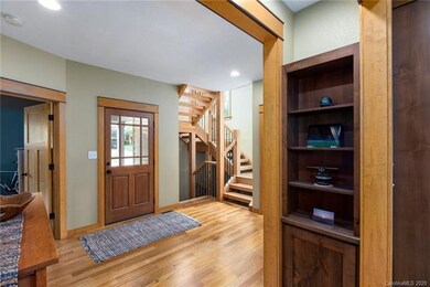 Entry Foyer with Custom Walnut Built-in Shelves