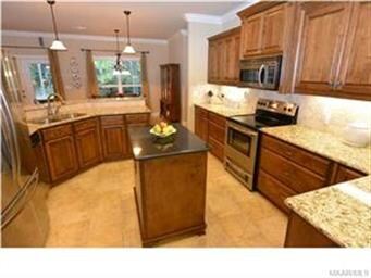 ANOTHER VIEW OF THE KITCHEN. NOTICE ALL OF THE CRO
