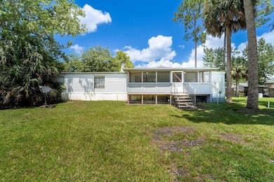 24031 Armadillo Rd, Astor, FL 32102 - photo 2