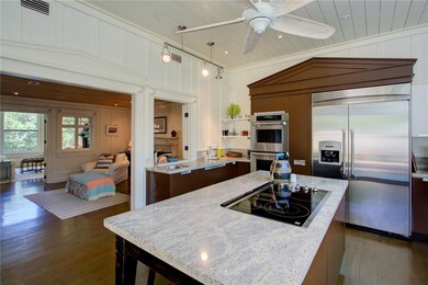 Kitchen view #3: open to den/dining