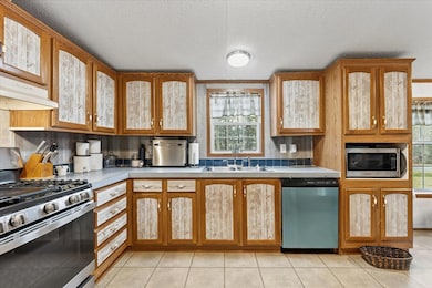 263 Mudgett Rd, Kenduskeag, ME 04450 - photo 4