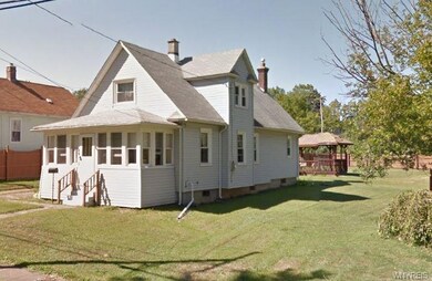 Exterior Front with large yard - fenced in on 3 si