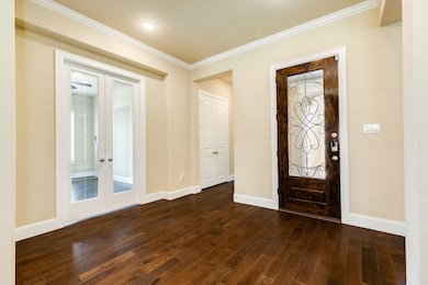 This house boasts beautiful hardwood floors, a gor