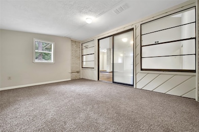 Versatile bonus room with entry to the backyard pa