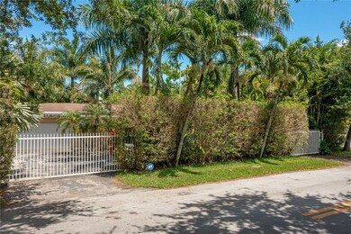 Front view of property with both gates closed.