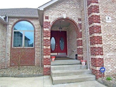 Arched Brick Entry w/ Covered Front Porch