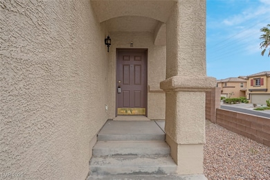 Entrance to property featuring stucco siding