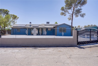View of front facade featuring a fenced front yard