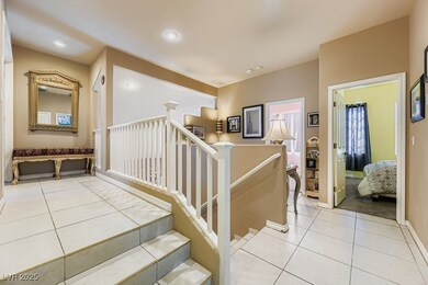 Stairs with tile patterned flooring and recessed lighting