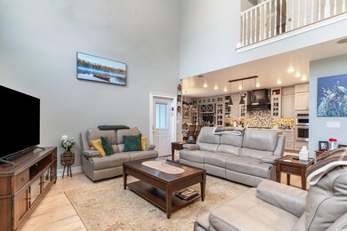 Living room featuring light wood-type flooring and