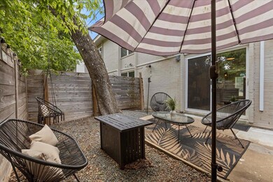 Fenced backyard with a patio