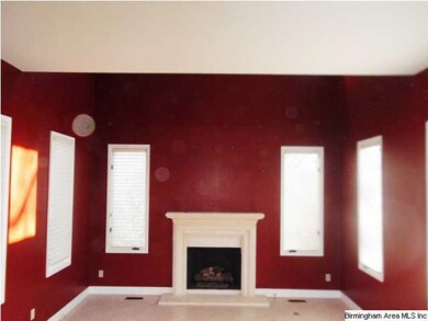 DEN WITH FIREPLACE JUST OFF LIVING ROOM