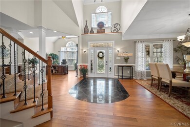 Welcoming 2-Story Foyer is complimented by Bamboo