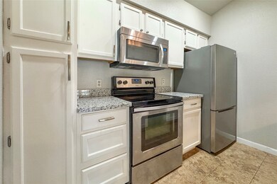 Kitchen with stainless-steel appliances