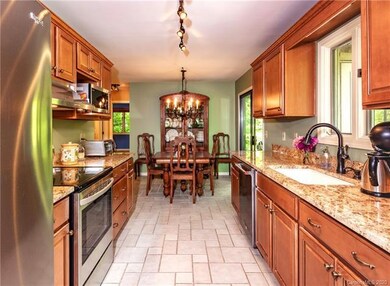 Kitchen with new granite counter tops and stainles