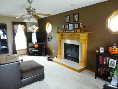 Living Room Notice the beautiful mantel and marble