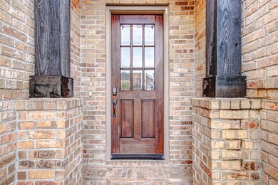 A covered front porch with stately pillars and 8' Mahogany wood front door with keyless entry will welcome you and your guests. Take a look inside - you will not be disappointed!