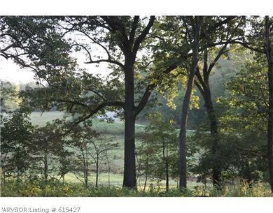 Exterior Back. View from the exterior porch that wraps around the house