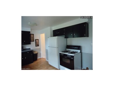 Kitchen has newer light fixture, outlets and switc