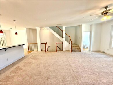 The beautiful Family Room with new carpeting, freshly painted, and new windows.