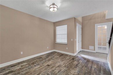 Living room with custom wood tile.