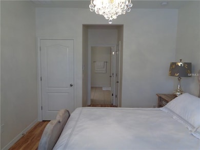 Master bedroom.  View towards walk-in closet and e