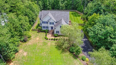 Picturesque winding driveway up to this lovely home.