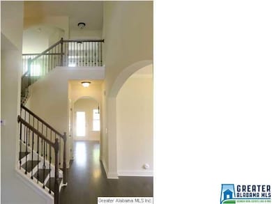 GORGEOUS TWO STORY ENTRYWAY WITH OPEN HARDWOOD STA