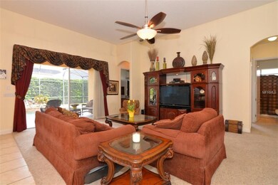 Spacious family room with sliders out to the scree