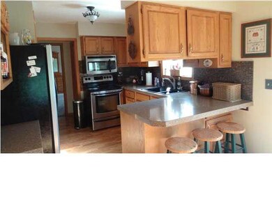 New kitchen appliances compliment the granite coun