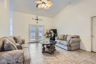 Living area with light tile patterned floors, base