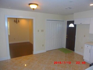 view 2 of kitchen area, dining room in back ground