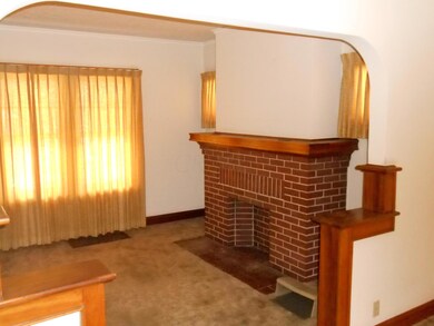 LIVING ROOM WITH DEC. FIREPLACE