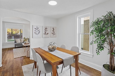 Main level: dining room with refinished hardwood floors and all new paint
