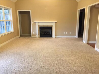 Huge living room with gas fireplace.
