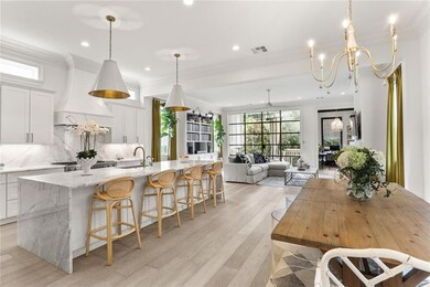Large open living, dining & kitchen in the rear.