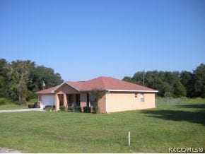 VIEW FROM ROAD CORNER LOT