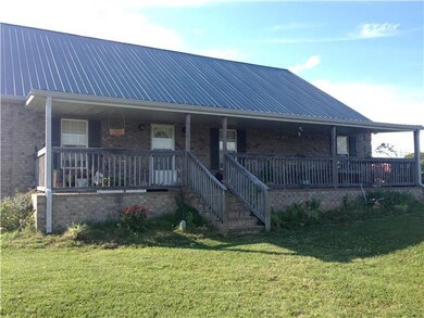Large rocking chair front porch and metal roof mak
