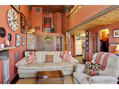 Living Room. Pantry, w/d, and additional storage a