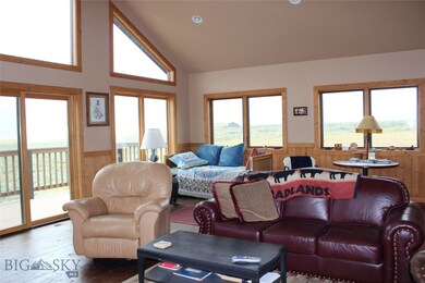 Great room with lots of windows to the view and th