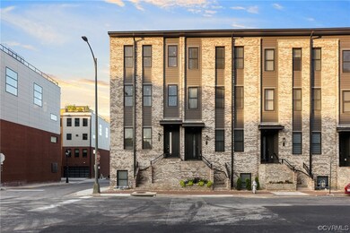 This 4 level townhome built in 2021 is LIKE NEW and features panoramic views of the James. Walk to Legend Brewing and all of the boutique shops and new restaurants that are filling the streets of Manchester, Richmond's hottest up and coming area.