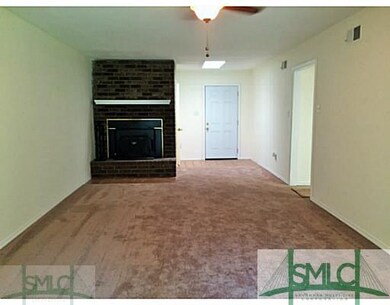 Exterior Front. Living room with fan and fireplace