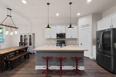 Kitchen featuring appliances with stainless steel 