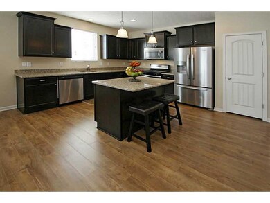 Kitchen. Staggered dark cabinets.