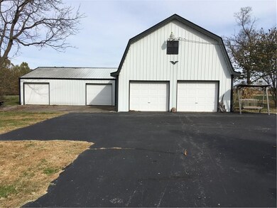 2- Story 42' x 25' Shop & 
30' x 25' Shop! 
Both with two pull up doors each, concrete floor and asphalt drives. 
