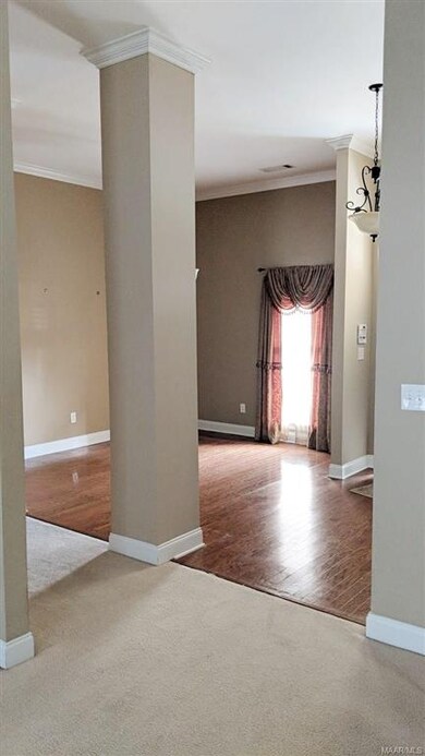 VIEW FROM GREATROOM INTO FORMAL DINING ROOM. NOTE 