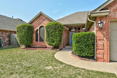 View of front of house with a garage and a front l
