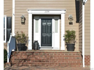 The front entrance is welcoming with a wide entryw