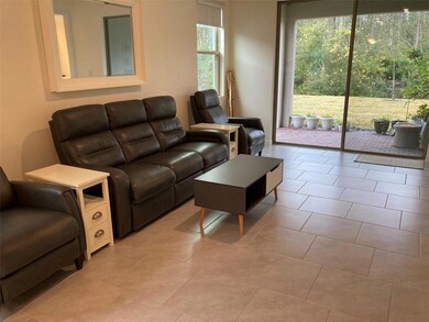 family Room Looking Out to Patio & Conservation Area